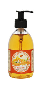 Nestesaippuapullo pumpulla, Hunaja-appelsiininkukka oranssilla etiketti jossa viikunan ja oliivin kuvia La Petite Provence